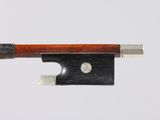 bow of a violin made of wood and metal on a white background