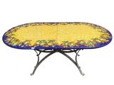 an image of a table with a yellow and blue tablecloth on it