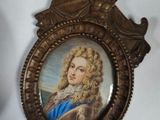 a picture of a picture of a man in a picture frame hanging on a wall