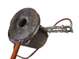 a metal object with a wooden handle on a white background