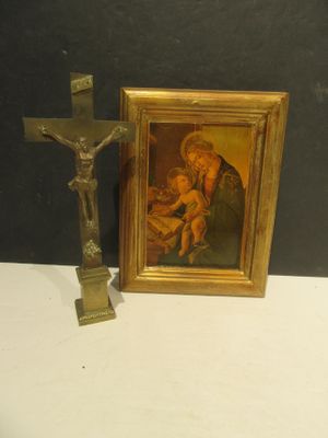 a picture of a crucif and a picture of jesus on a cross