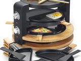 an image of a toaster oven with a variety of cooking utensils