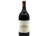 a bottle of wine that is sitting on a table