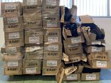 a large pile of boxes that are stacked on top of each other