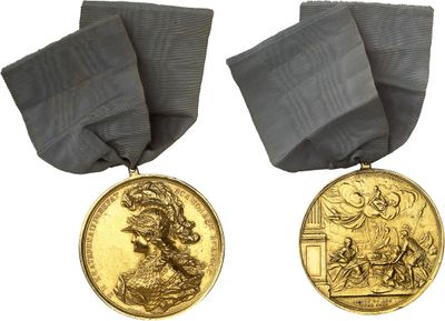 two medals with ribbons and a ribbon around them on a white background