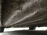 a close up view of a car ' s tire on the ground