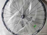 a bicycle wheel that is wrapped up in plastic