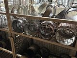 many different types of pots and pans on the shelves