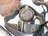 many different types of leather items on the table