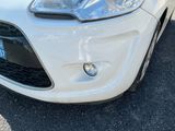 a close up of a car that has a denting on it