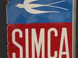 a blue and red sign with a bird on it