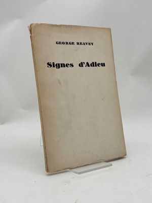 un gros plan d'un livre sur une surface blanche avec un fond blanc
