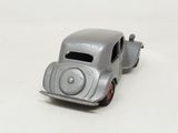 a toy car that is sitting on a white surface