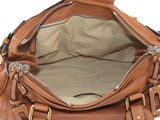 the inside of a brown purse with a zipper on it