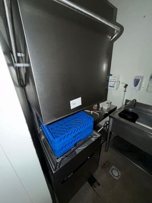 an image of a kitchen with a blue blanket on the counter
