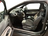 the interior of a car with the door open and the driver ' s seat up