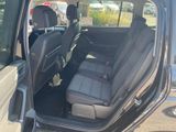 the back seats of a car are empty in the parking lot