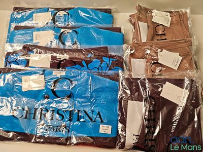 a lot of clothes that are wrapped in plastic bags