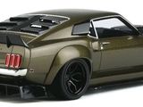 the car is brown and has black rims on the back of it