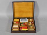 a wooden box with a variety of items in it