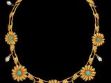 un collier en or orné de perles et de turquoises