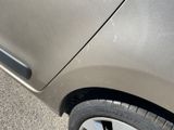 a close up of a car ' s door handle on the side of the car