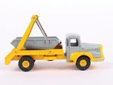 a toy truck with a crane on the back of it
