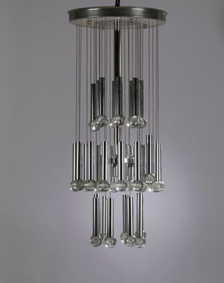 a close up of a chandelier hanging from a ceiling