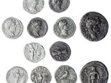 une image représentant une collection de pièces de monnaie romaines antiques sur fond blanc