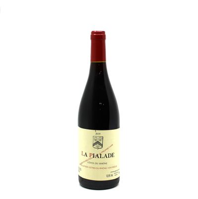 bottle of red wine with a red cap on a white background