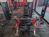 a gym with a lot of equipment in it