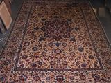 a large oriental rug on the floor in a room