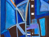 tableau représentant une œuvre abstraite bleue et noire sur un mur blanc