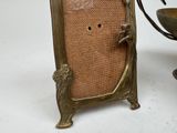 a picture of a picture frame with a bird on it