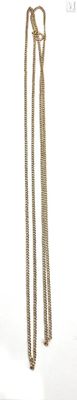 a picture of a pair of earrings that are hanging from a chain