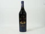 a bottle of wine that is sitting on a table