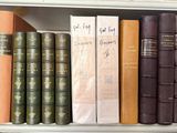 many books that are on a shelf together