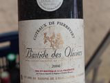 a bottle of wine that is sitting on a table