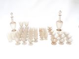 a lot of glass items that are sitting on a table