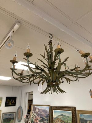 a large chandelier hanging from the ceiling in a room