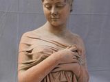 statue of a woman holding a baby in her arms