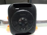 a close up picture of a small black device on a table