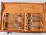 a wooden box with several forks and spoons in it