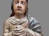 statue of a woman holding a baby in her arms