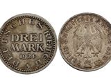 une pièce d'argent portant l'inscription « dreif mark »