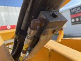 a close up of a metal pole with a bolt on it
