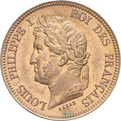 a close up of a coin on a white surface with a white background