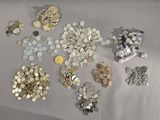 a lot of coins that are on the table