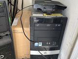 two computers that are sitting next to each other on the floor