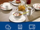 a table with a variety of food and drinks on it